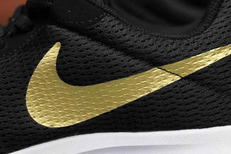 Nike Tanjun 'Metallic Gold' AQ7154-001: Sleek and Stylish Footwear for a Standout Look